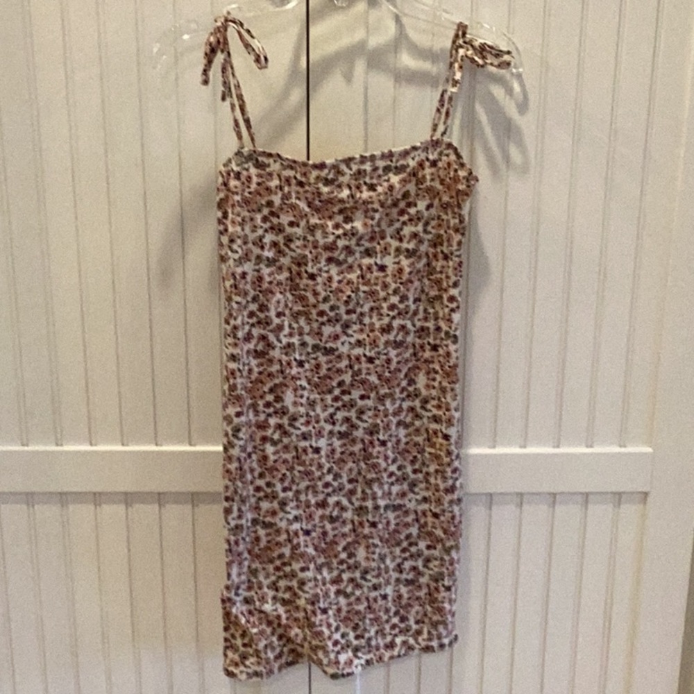 Floral print, mini sundress w/ tie spaghetti strips. XS.